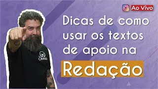 "Dicas de como usar os textos de apoio na Redação" escrito sobre fundo roxo ao lado da imagem do professor