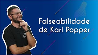 Professor ao lado do texto"Falseabilidade em Karl Popper"