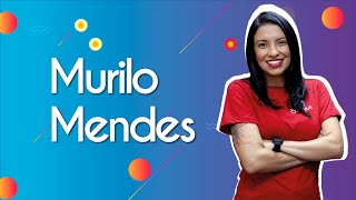 Professora ao lado do texto"Murilo Mendes"