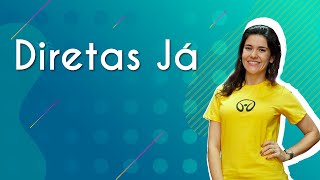Professora ao lado do texto"Diretas Já"