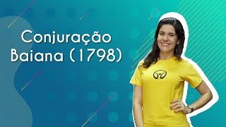 Professora ao lado do texto"Conjuração Baiana (1798)"