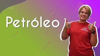 Professora ao lado do texto"Petróleo"