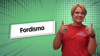 "Fordismo" escrito sobre fundo verde ao lado da imagem da professora