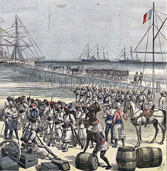 Navios franceses desembarcando no porto de Guiné, em texto sobre imperialismo.