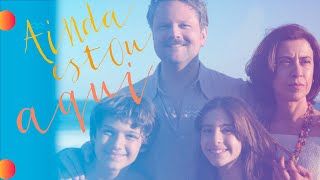 Título "Ainda Estou Aqui" escrito sobre fundo do poster oficial de divulgação do filme.