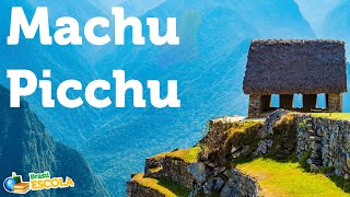Título "Machu Picchu" ao lado de estrutura edificada no topo de uma montanha.